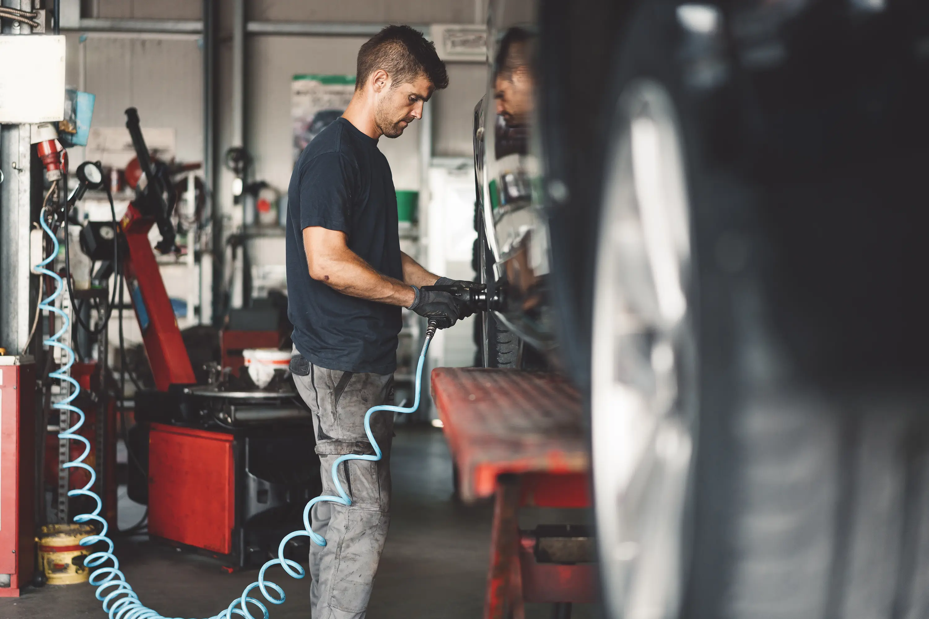 mechanic changing tire